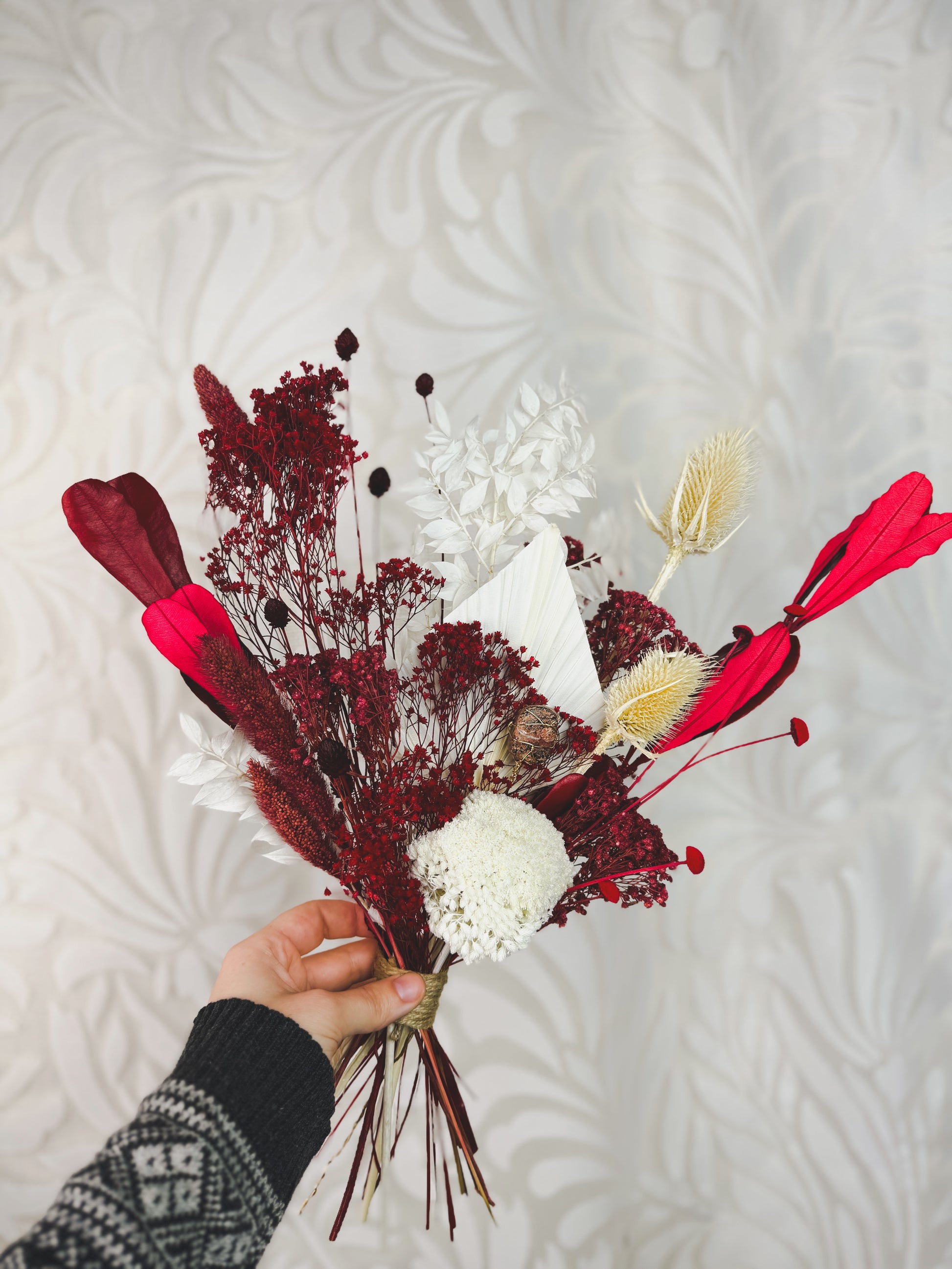 Red and white dried flower bouquet