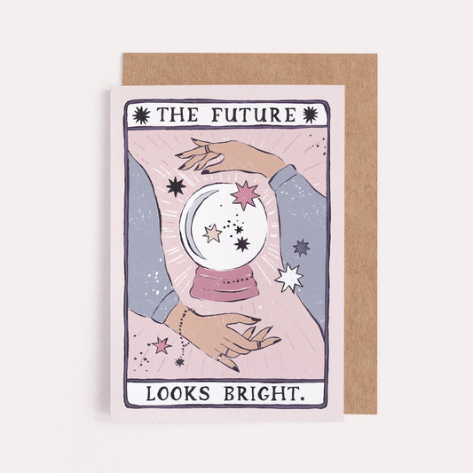 A greeting card with an illustration of a crystal ball that says "The Future Looks Bright"