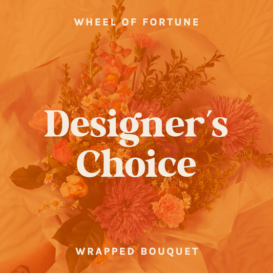 Text on orange background reads "Wheel of Fortune - Designer's Choice Wrapped Bouquet"