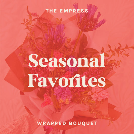 Text on pink background reads "The Empress - Seasonal Favorites Wrapped Bouquet"