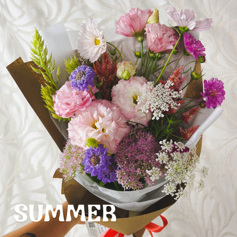 Seasonal bouquet featuring all local Wisconsin summer flowers like Lisianthus and Scabiosa